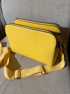 Yellow shoulder bag like new with strap and silver details