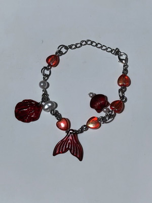 Bracelet red and silver with sea shell and mermaid tail details like new