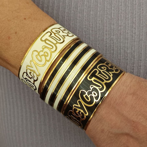 Juicy Couture three gold-tone bangle bracelets like new