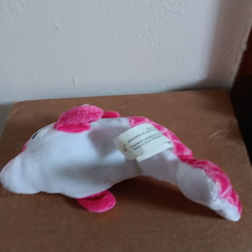 Plush dolphin like new, pink color