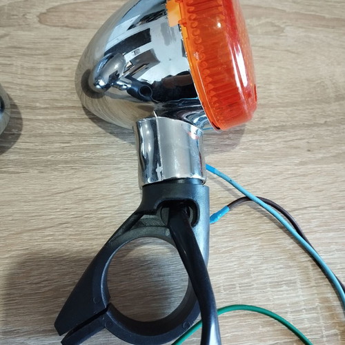 Motorcycle turn signals new with chrome base and orange cover