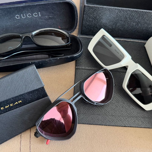 Prada and Gucci sunglasses set used