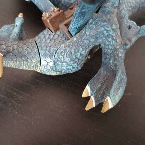 Large blue dinosaur toy figure