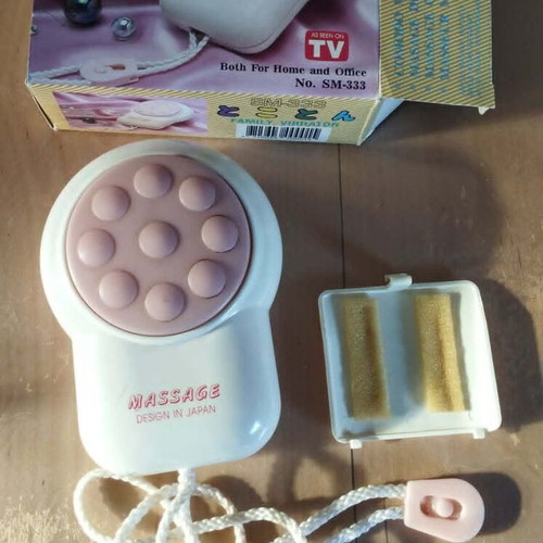 Portable Massage Device like new, battery operated, ergonomic design