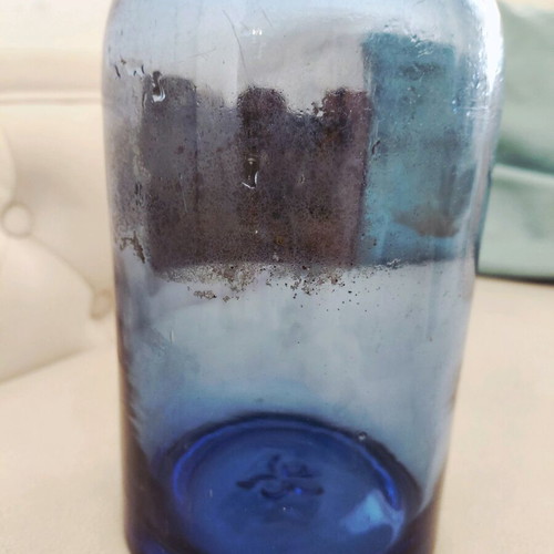 Vintage blue glass bottle used from the 1960s