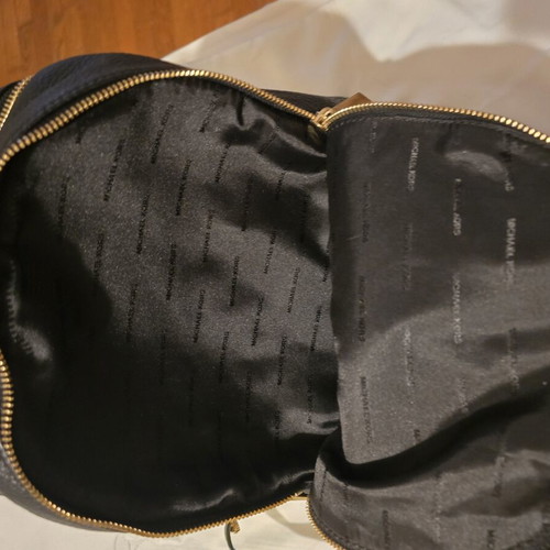 Michael Kors black backpack like new with gold details