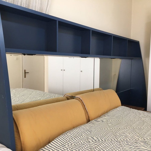 Modern bedroom set used with double bed, mirror, shelves, 2 nightstands, mattress, pillows, and reversible duvet