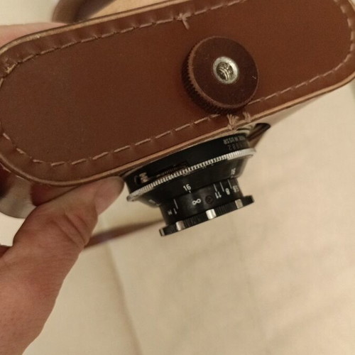 Cosmic 35 camera used, non-functional with leather case