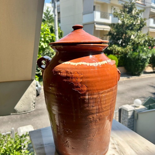 Old traditional ceramic jar used, handmade with lid
