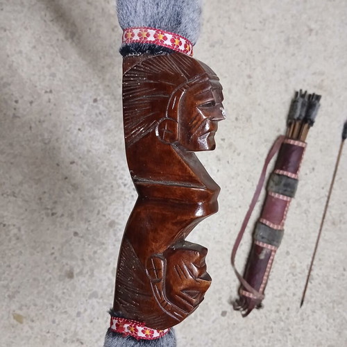 Decorative wooden carved bow with arrows like new