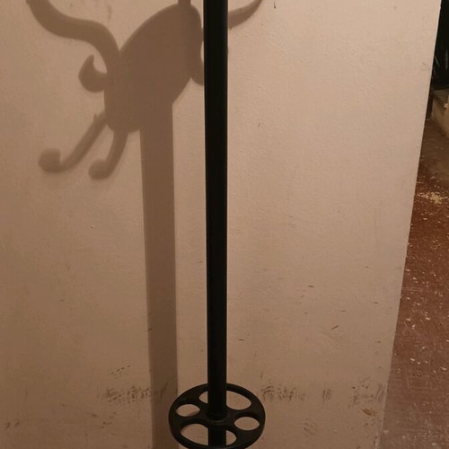 Coat hanger used with plastic hooks and weighted base