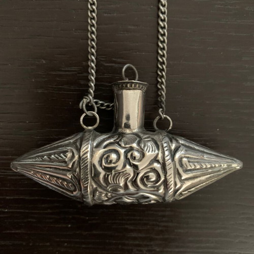 Vintage necklace with perfume holder used