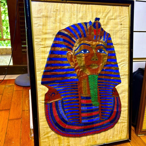 Set of framed real papyrus pictures with bronze or copper statue and marble lamp