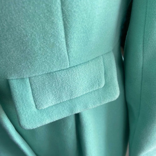 Vintage green coat with beige faux fur collar used