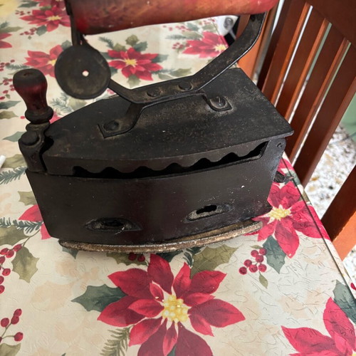 Iron with base and charcoal used