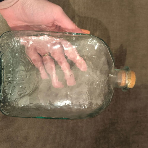 Bottle with cork made of recycled glass like new