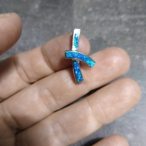 Silver cross with opal like new, modern design