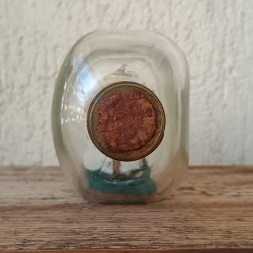 Vintage decorative ship in glass bottle used