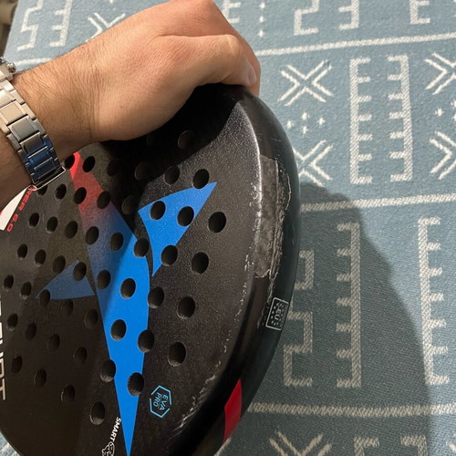Padel racket Drop Shot used with signs of wear