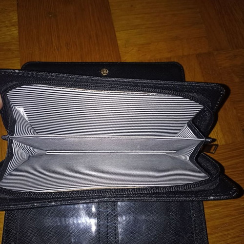 Black wallet slightly used with multiple compartments