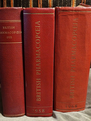 British Pharmacopoeia 3 volumes used, red leather hardcover set