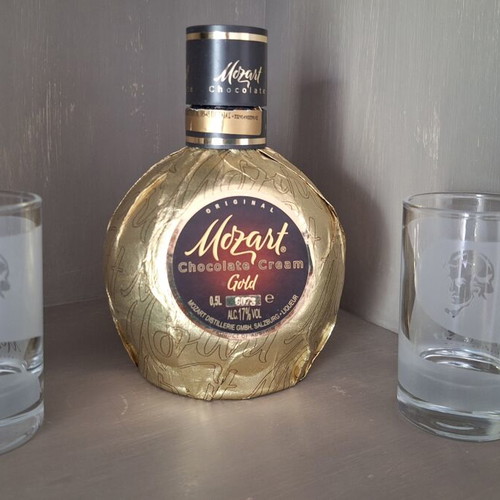 Mozart chocolate cream gold bottle with two promotional glasses used