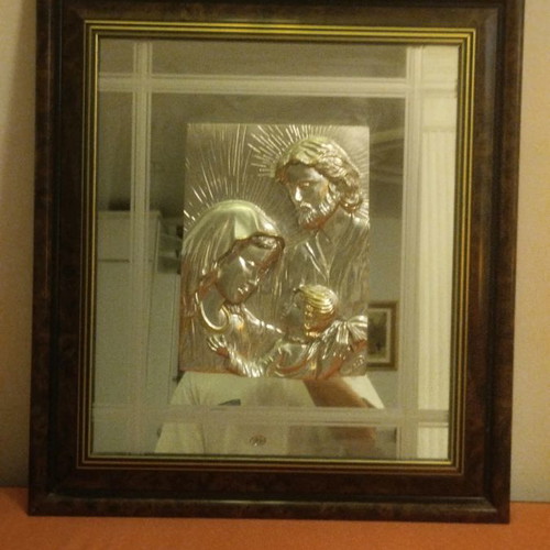 Silver icon used with mirror