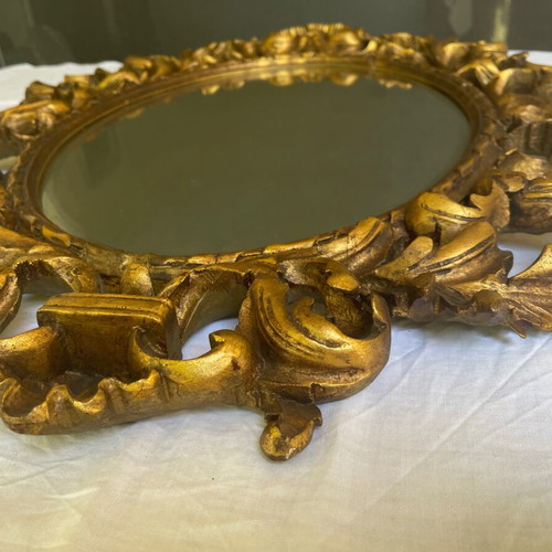 Antique mirror used with hand-carved frame over 100 years old