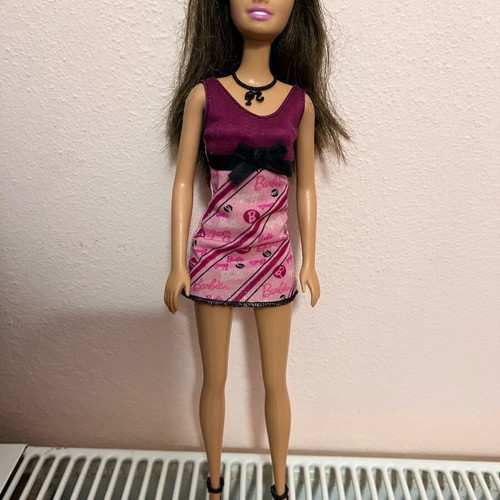 Barbie Purple Dress Doll 2002 Version like new with purple dress and black sandals