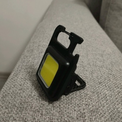 Mini LED Keychain with Three Flashlight Modes, Rechargeable, Magnet, and Opener