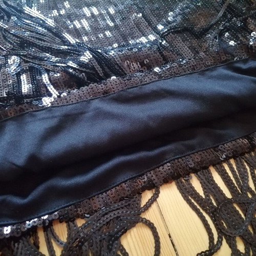 Something New women's black sequin skirt with fringes, XS-S