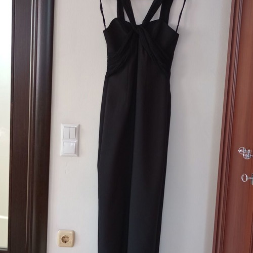 Multifunctional black dress with vintage gold earrings