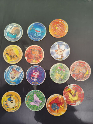 Pokémon tazos in moderate condition