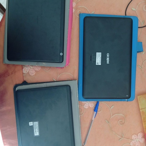 Huawei MediaPad T5 and Alcatel 1T tablets used, with cases