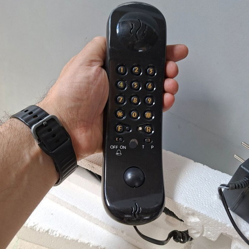 Vintage wired home phone with transparent neon design, new