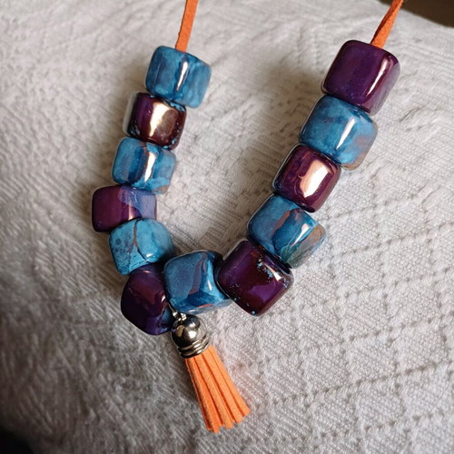 Necklace new from leather and ceramic beads