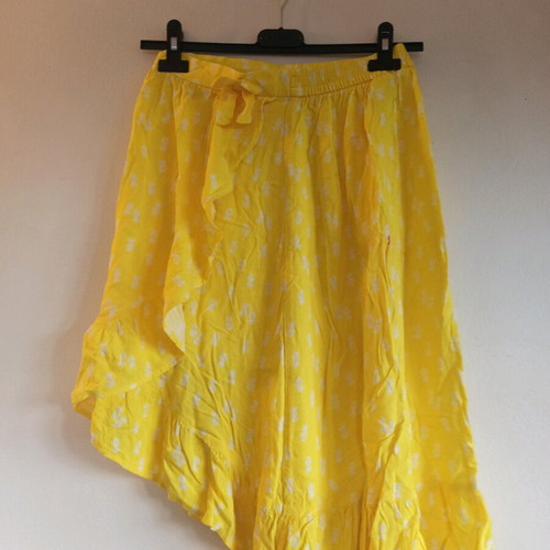 Asymmetric yellow skirt with ruffle used, size S