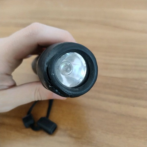 Duracell flashlight used with wear on front part