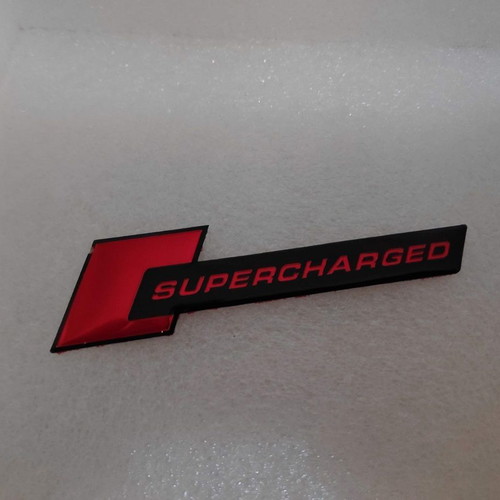 Supercharged Aluminum Badge like new