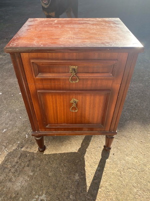 Wooden bedside cabinet used with drawer and cupboard