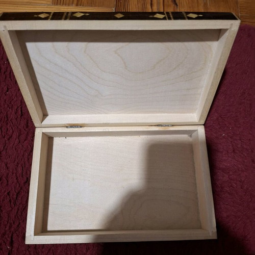 Handmade wooden jewelry box used with Ukrainian folk art