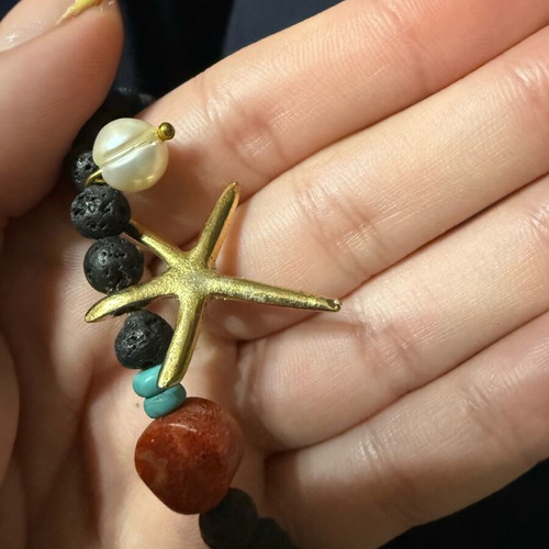 Bracelets set used, two with starfish and double design