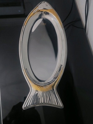 Stainless steel fish-shaped platter with gold details like new