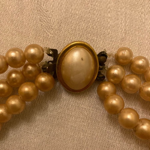 Vintage necklace with 3 rows of pearls used with unique clasp