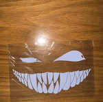 Car sticker with scary smile and eyes, white