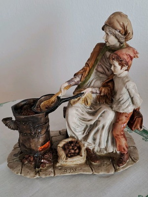 Antique used bimbelo with artist signature