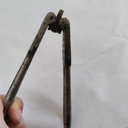 Vintage reversible double-jaw nutcracker used