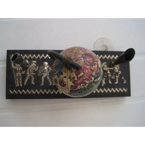 Desk accessory for pens used, metal with globe and knights