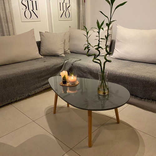 Coffee table new gray with glossy lacquer surface and solid legs