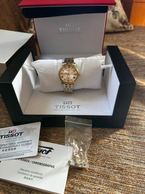 Tissot Carson women's wristwatch, silver and gold bracelet